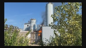1 hurt after gas-fed industrial fire
