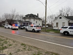 Man charged after releasing dog on officers, barricading self in garage