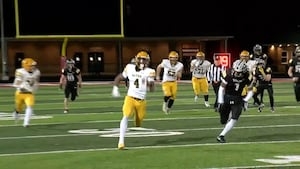 Which area football teams are changing OHSAA playoff divisions this season?