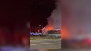 Smoke pours from structure after fire in Sidney