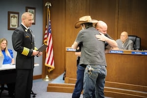 Township honors citizen responsible for saving unconscious man from burning house