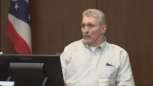 Man accused of hitting his daughter with truck before police crash, shooting takes stand in trial
