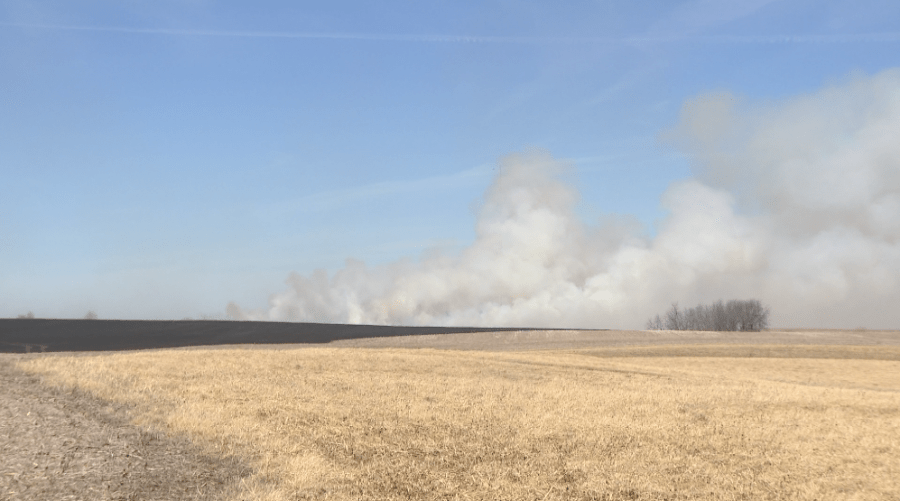 Multiple departments battle large field fire near Pleasant Hill