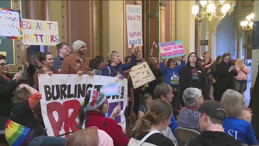 LGBTQ Iowans rally less than two weeks after being stripped of civil rights protections