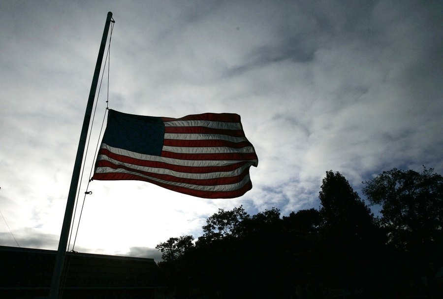 Why are flags flying at half-staff in Pennsylvania?
