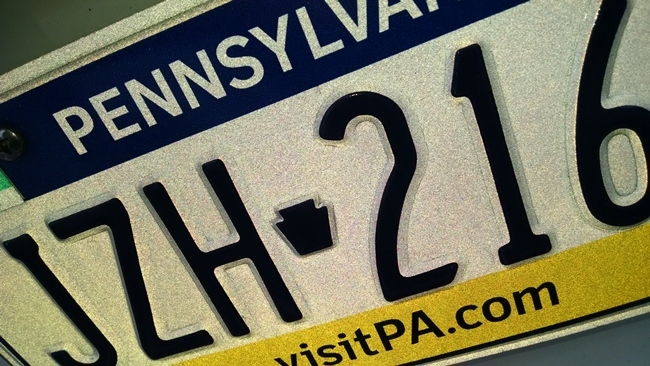 Local police, lawmakers host license plate replacement event