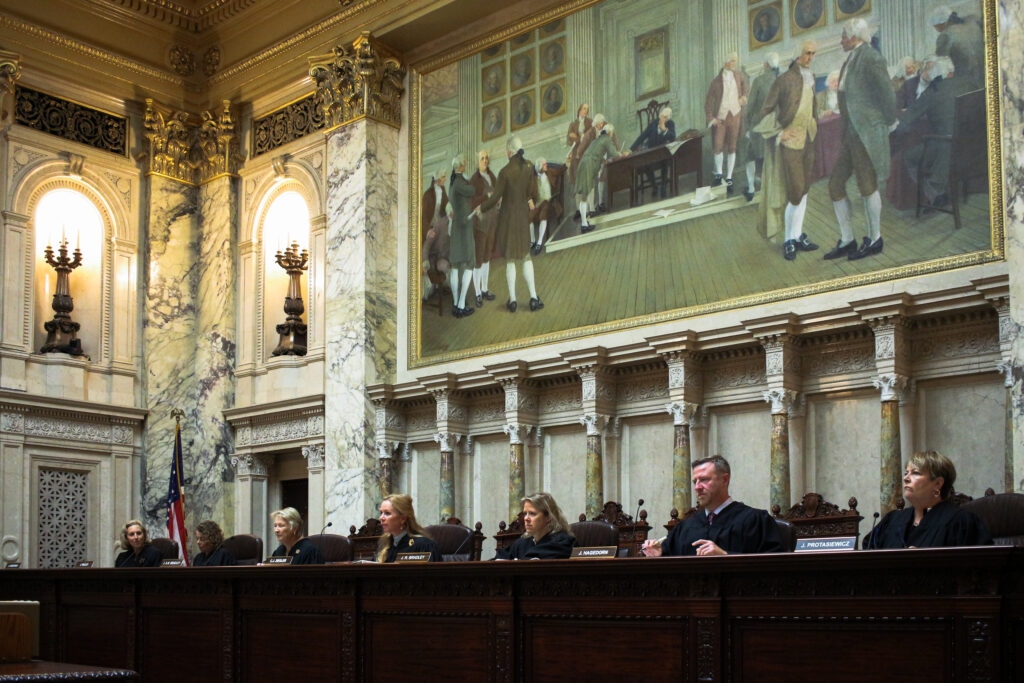 Supreme Court hears case on disagreement over literacy programs and Evers' partial veto