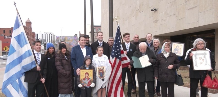 Local Greek community raises flag outside of City Hall