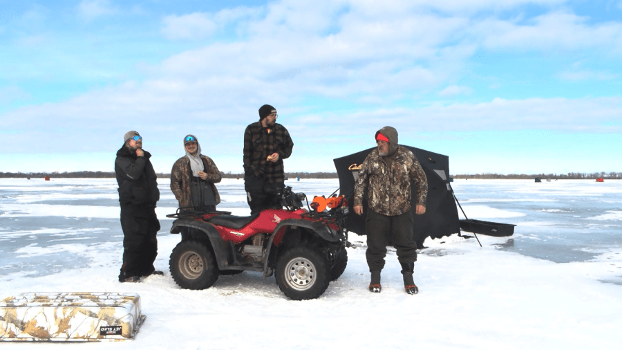 Erie residents enjoy frozen winter fun on icy Presque Isle Bay