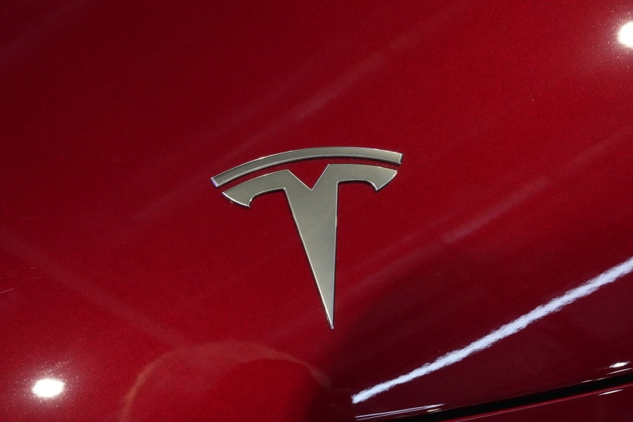 Self-driving Tesla hits car, sign while driver sleeps behind wheel