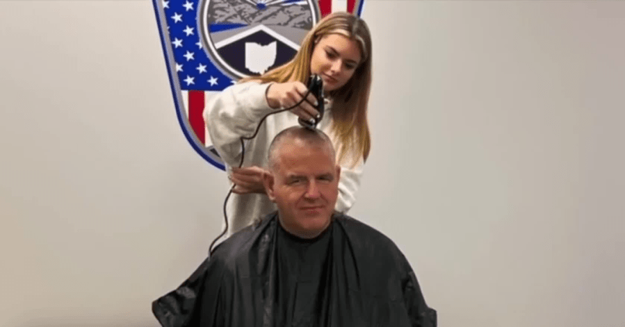 ‘No one fights alone': Ohio officers shave heads in solidarity with woman facing cancer