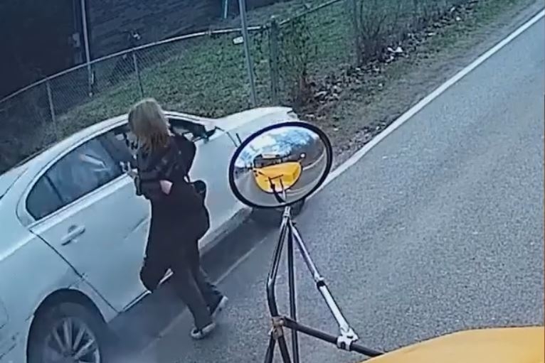 Man charged with DUI, driving around school bus after child nearly hit by car