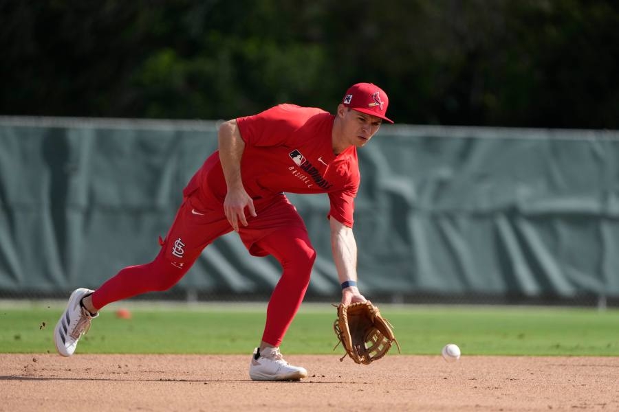 Pirates claim position player from division rival
