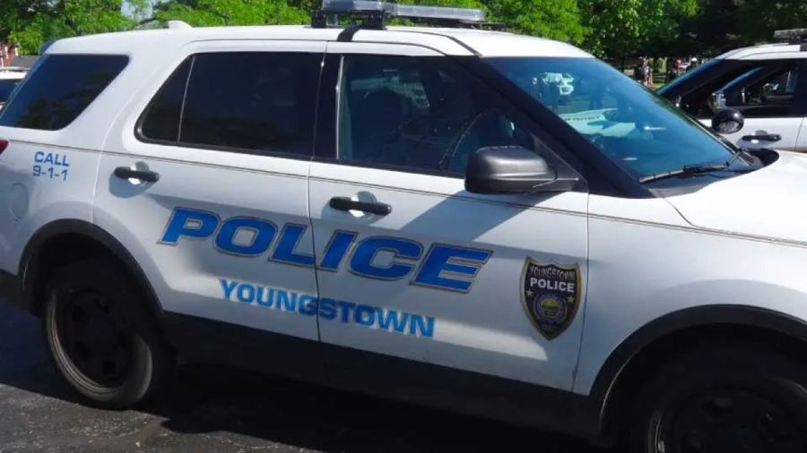 Report: Woman runs into garage in Youngstown, drives away with kids in car