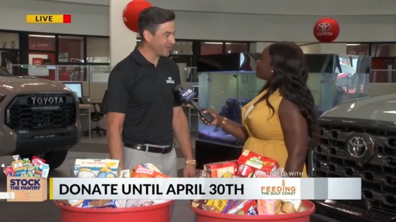 Palmer's Toyota collecting food for Stock the Pantry