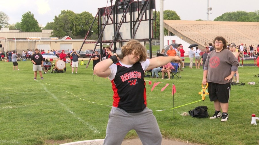 English Teacher & Backyard Flowers: A Washington shot putter's record-breaking journey