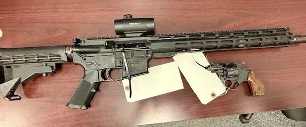 Law enforcement says two men arrested, two guns seized after robbery in Washington