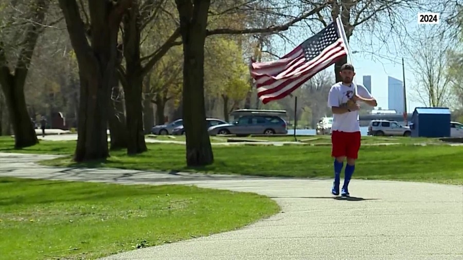 Flag-touting runner to carry stars and stripes from Grand Rapids to Sand Lake