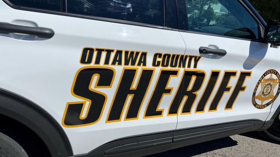 Deputies: Driver crashes into car dealership near Fruitport