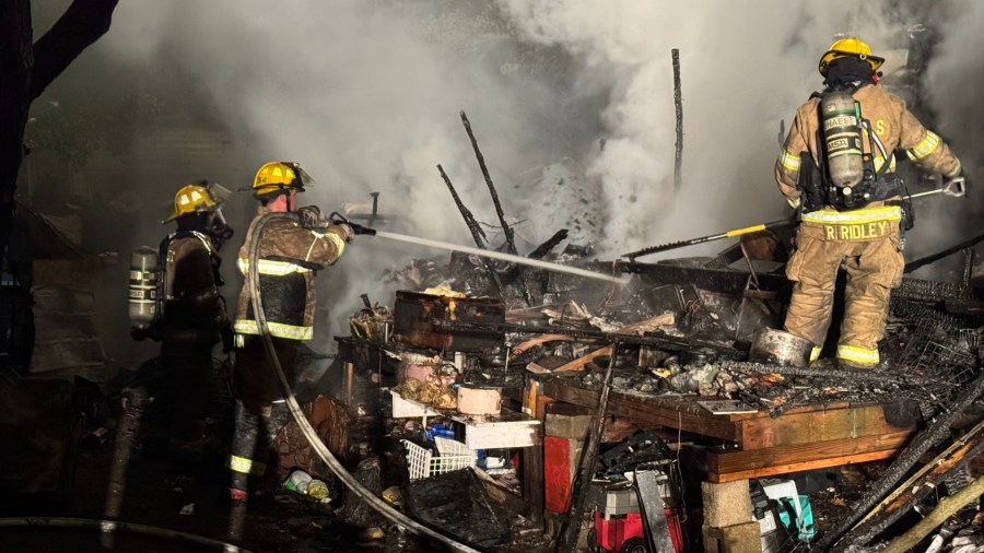 2 escape burning travel trailer in Casco Township