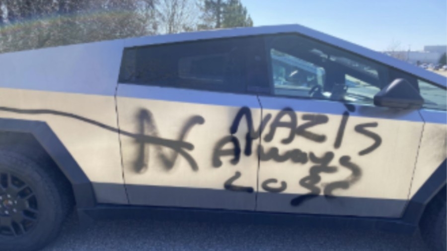 Police: Tesla trucks spray-painted, damaged in Kentwood lot