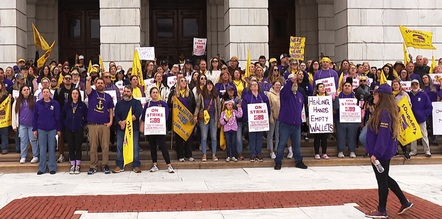 Striking Butler Hospital workers rally at State House