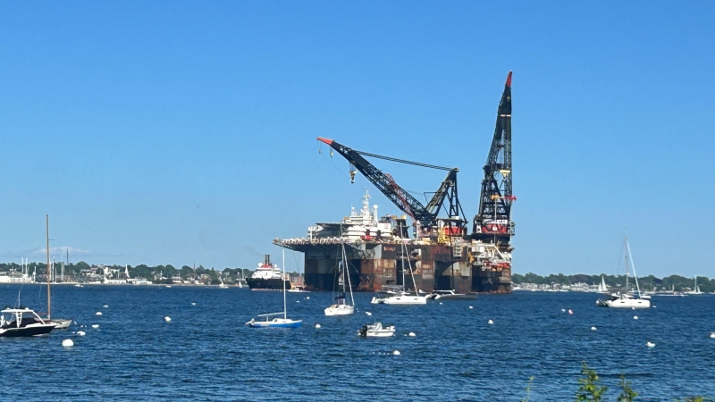 What is the large crane ship off the Rhode Island coast?