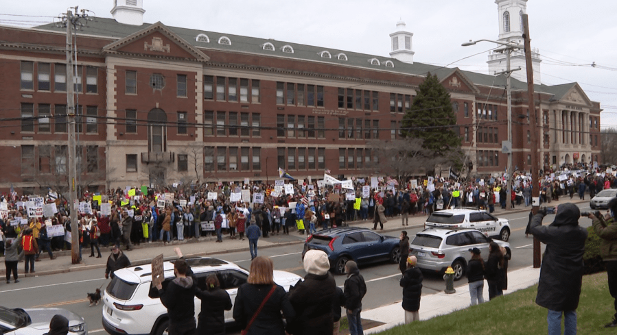 Thousands protest Trump, Musk in Providence rally