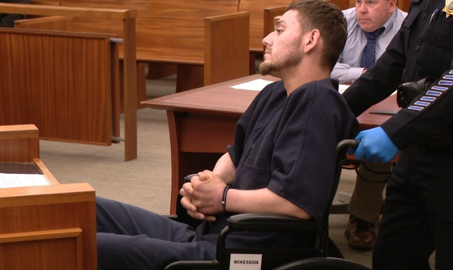 Driver charged with hitting Johnston officer held without bail