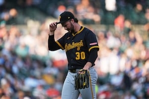 Pirates outlast Tigers through rain delay and blown lead; no win for Skenes