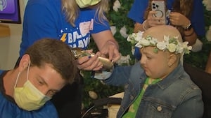 Pitt quarterback shaves head in show of support for multi-organ transplant patient