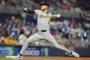 Pirates walked off by Marlins again; bad send in 12th