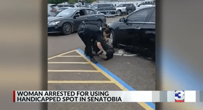Woman said she was wrongfully arrested over handicap parking space