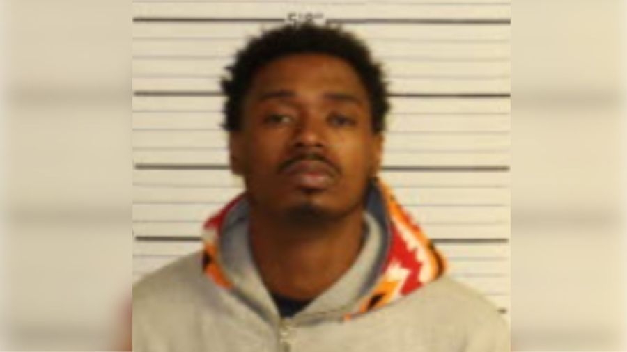 Man accused of shooting at woman sitting in car