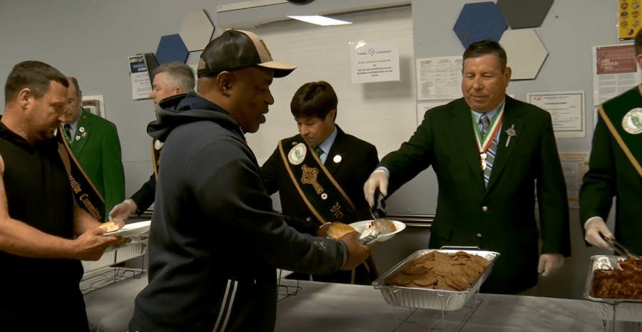 Parade officials help at annual Union Mission green breakfast