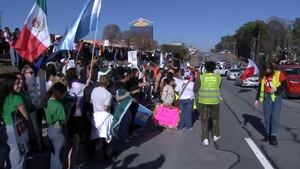 Dozens rally in DeKalb County in ‘A Day Without Immigrants' protest