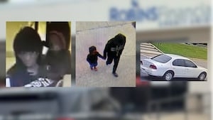 Woman accused of bringing young child to rob GA bank