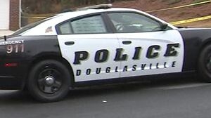 Police investigate possible murder-suicide at Douglasville shopping plaza