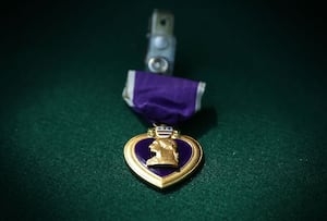 GA salvage worker finds WWII vet's Purple Heart in junk pile. Here's the journey to return it