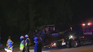 Officer hurt after colliding with dump truck in DeKalb County