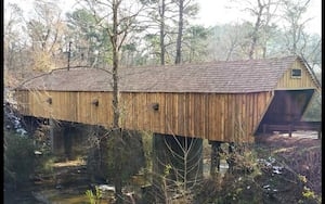Repairs to historic Cobb County bridge completing today after someone hit it... again