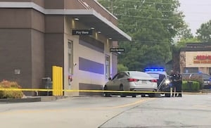 McDonald's drive-thru blocked off after car shot up in DeKalb County