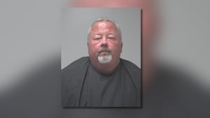 High school principal behind bars after deputies called to Coweta County home