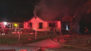 Woman dies in Atlanta house fire after saving man trapped inside, investigators say