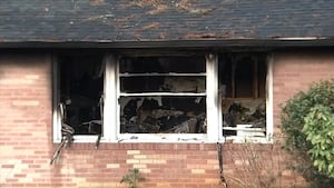 Police identify mother who died running into burning Cobb home to save puppy