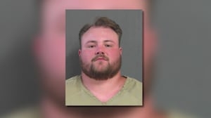 North GA man charged with capital murder after man found shot crashes into home
