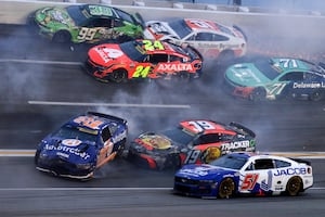 Home-state favorite Chase Elliott passes Brad Keselowski on final lap to win NASCAR Atlanta race