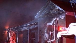 Early morning house fire displaces family, cats in southwest Atlanta