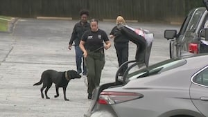 Police search for shooter who injured 2 at crowded park during graduation