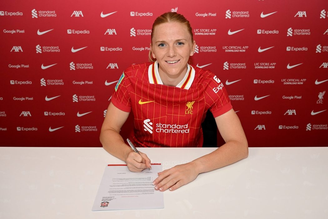 Liverpool midfielder Holland signs new deal
